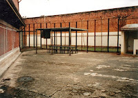 Two Yard, Boggo Road. The shelter shed, with table, benches and TV box,  is in the centre. (BRGHS)