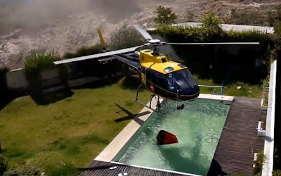 Piloto de helicóptero abastece numa piscina pequena em Braga (video)