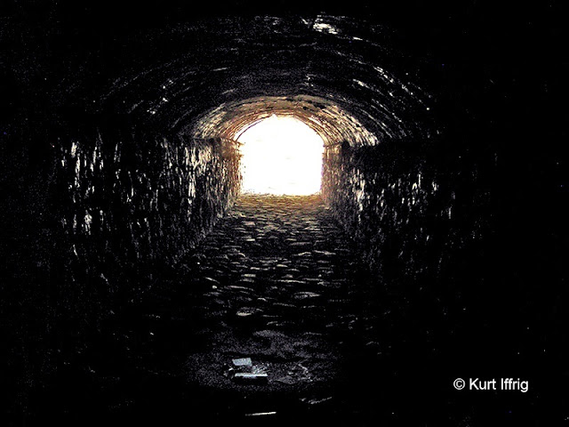 Under Mt. Baldy Road there's a greffiti filled tunnel that looks out directly on Spring Hill.