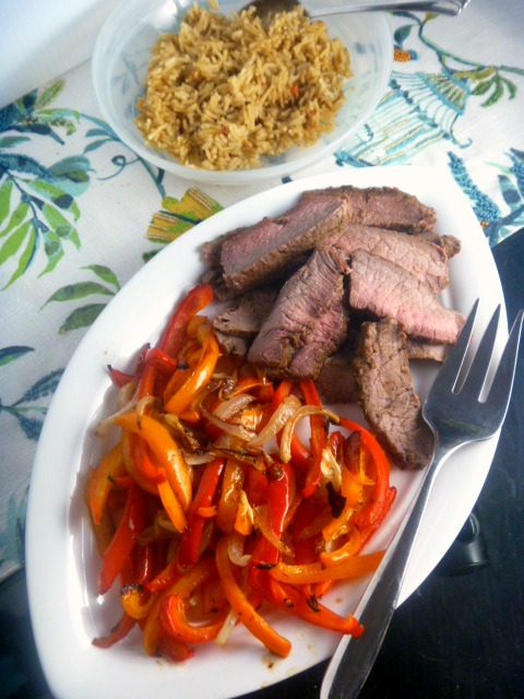 Sheet Pan Beef Fajitas: Caramelized onions and peppers mixed with juicy meat, wrapped up in a hot fluffy tortilla. - Slice of Southern