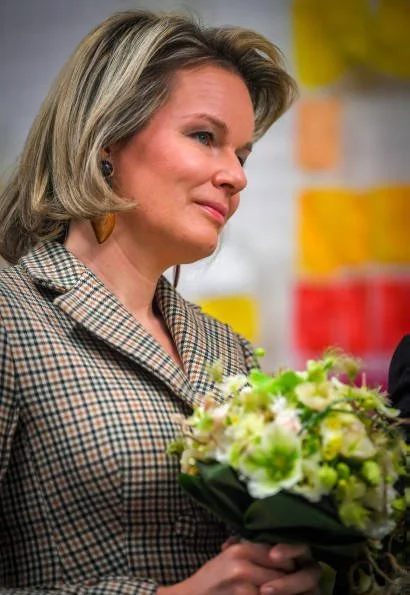 Queen Mathilde is wearing a checked coatdress from NATAN Couture Fall Winter 2017 collection. De Loods art centre in Duffel