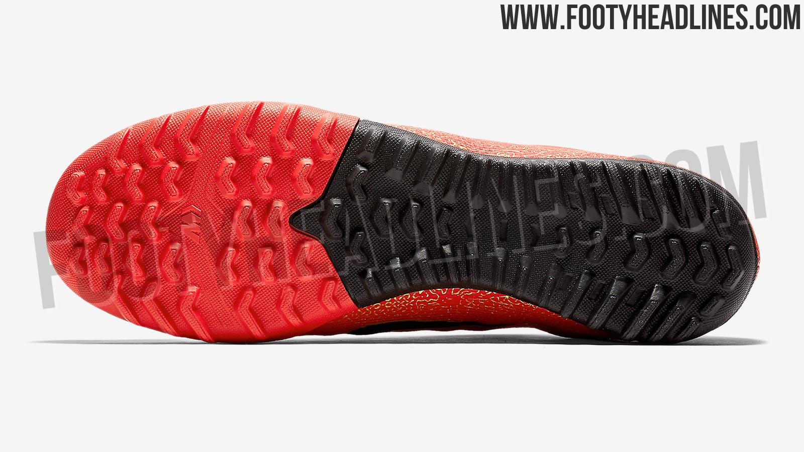 cristiano ronaldo black and gold boots