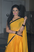 Sri Mukhi Glamorous Photos in Yellow Saree HeyAndhra