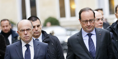 El presidente francés François Hollande y el actual primer ministro Bernard Cazeneuve