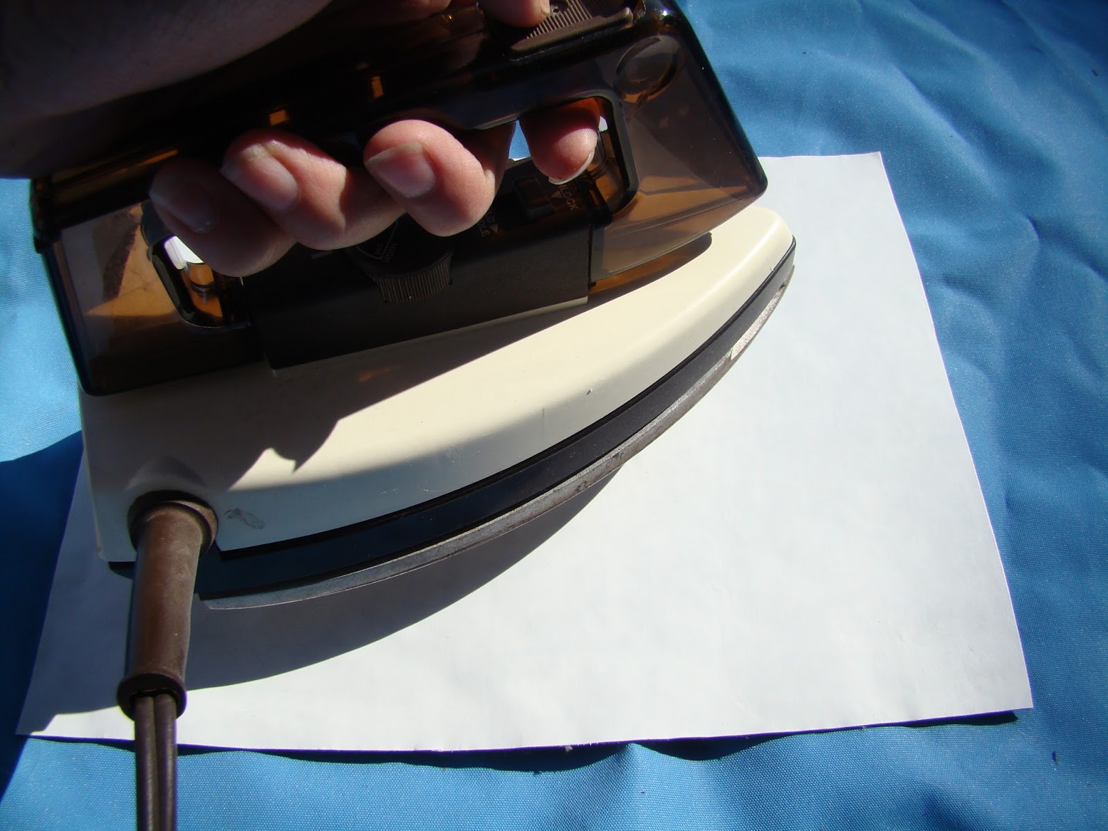 Cindy Riddle Repairing Holes in a Boat Cover