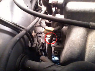 location of 22re top bolt, view from back of engine behind EFI