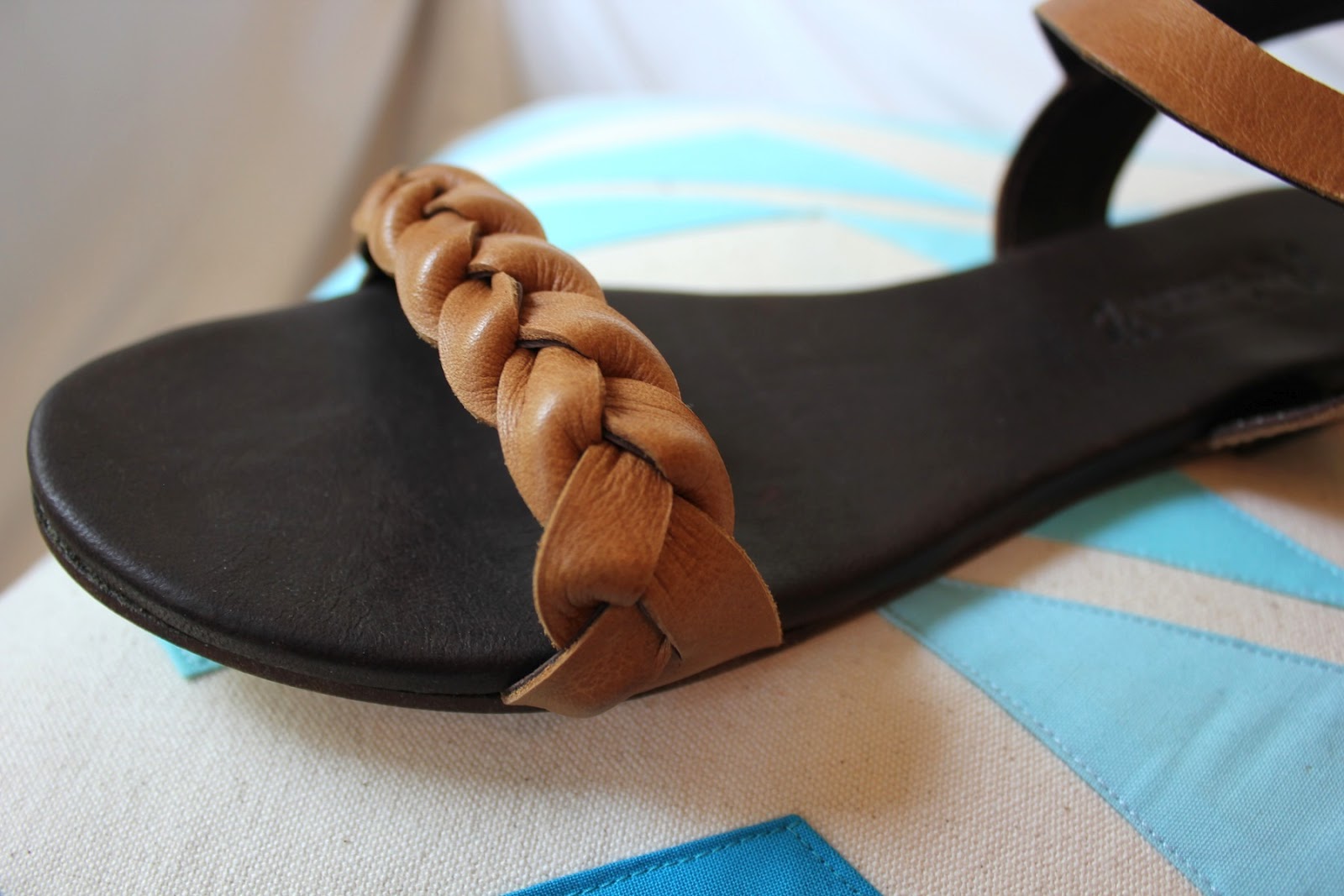 ariana bohling braided slide sandals