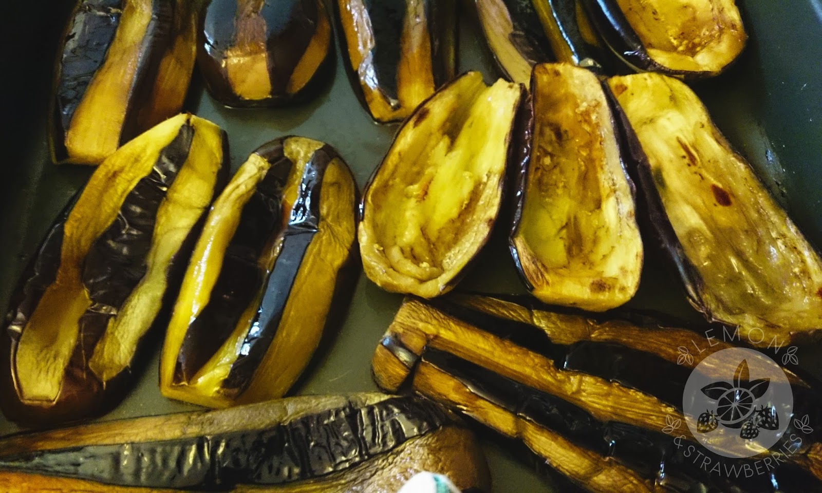 Place the eggplants on the baking pan and bake them in the oven until