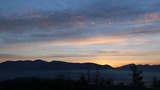 A slight glimmer announces the sun A slight glimmer announces the sun