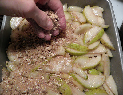 Hand Sprinkling Topping over Pears