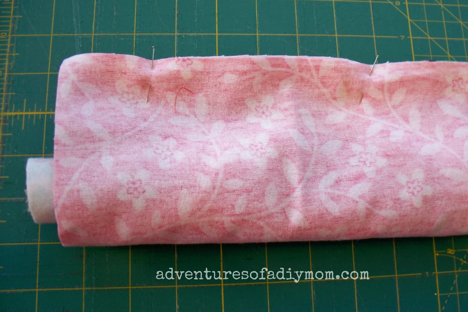 fabric rolled up for a sausage pillow case