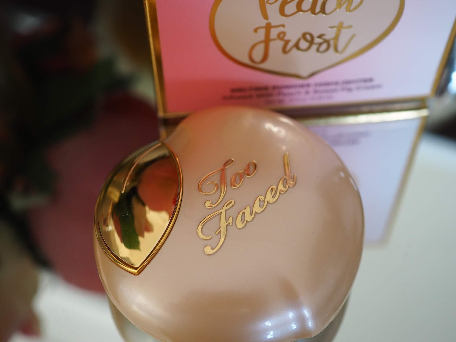 too faced peach frost highlighter