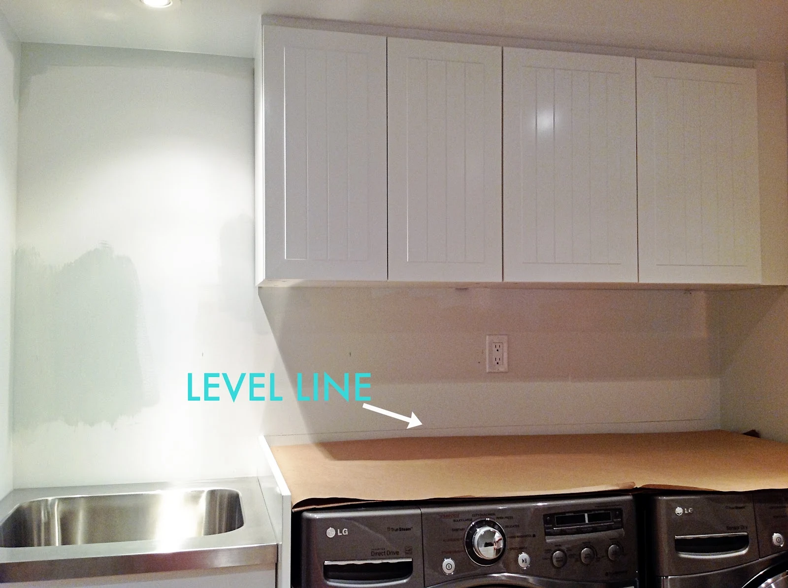 How To Install A Countertop Over A Washer And Dryer, DIY floating countertop in the laundry room, countertop cleat, counter over front load washer and dryer
