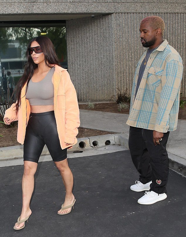 Kim Kardashian Displays Her Dangerous Curves In Yeezy Rubber Shorts ...