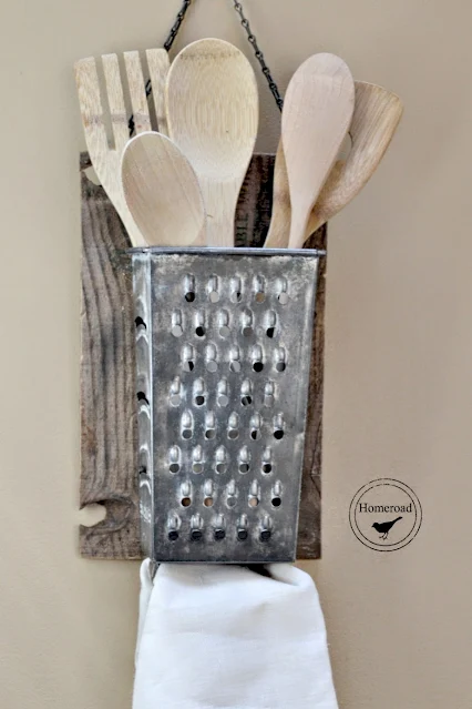 vintage cheese grater with wooden spoons