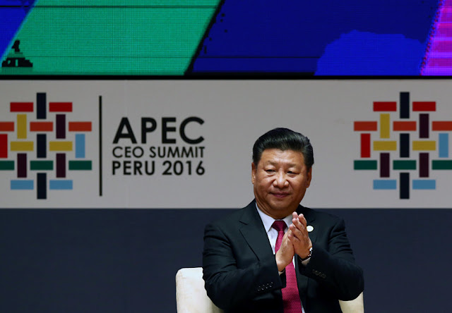  Image Attribute: China's President Xi Jinping applauds while attending a meeting of the APEC (Asia-Pacific Economic Cooperation) Ceo Summit in Lima, Peru, November 19, 2016. REUTERS/Mariana Bazo