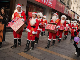 man more Santas in Wenzhou