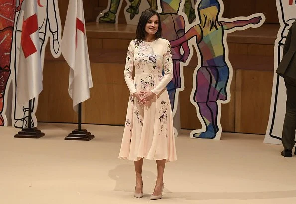 Queen Letizia wore a tall floral and bird embroidery midi dress by Asos Design. Letizia is wearing a Asos floral dress