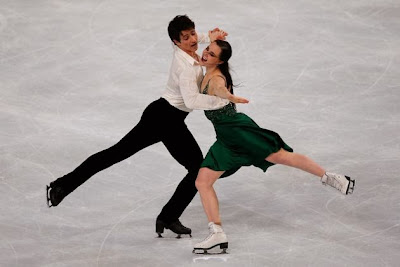 Tessa Virtue og Scott Moir (CAN) udfører deres fridans ved Trophée Eric Bompard 2013