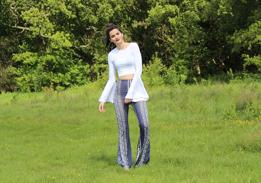 peexo-fashion-blogger-wearing-white-crop-top-with-bell-sleeves-and-boho-flares-festival-boho-lookbook
