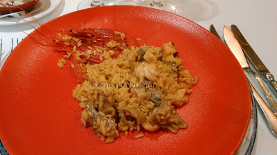 arroz marinero con tropezones, alcachofas y carabinero