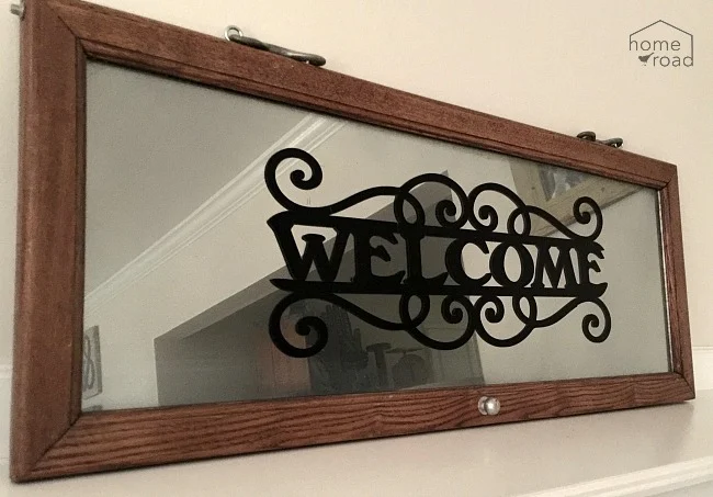 Welcome sign using mirror spray and a welcome sign