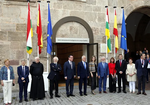 Queen Letizia of Spain attends the opening of the 11th International Seminar on Language and Journalism. Letizia wore Uterque Coat, Leather Trouser and Sandals