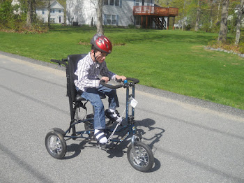 Riding his bike