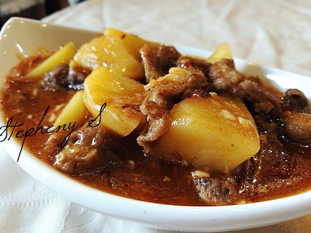 Stew Beef with Potatos Pieces with sauces