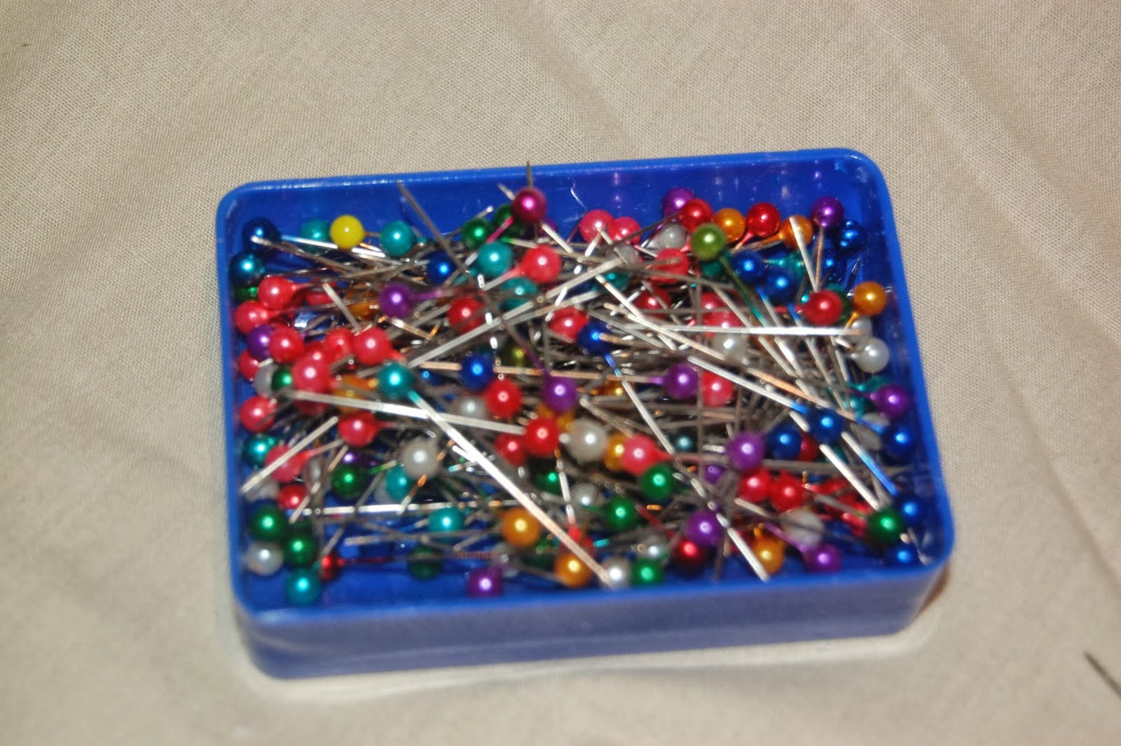 A Tray of Bliss Silver threads and golden needles and pearl like pins...