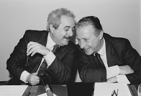 This famous picture of Falcone (left) and Borsellino, sharing a joke, was published by Time magazine