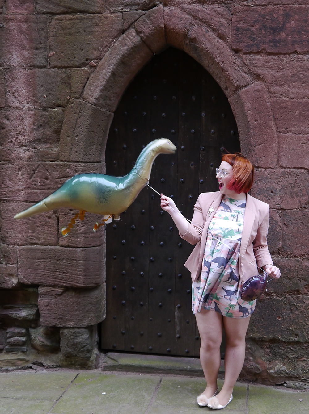 Styled by Helen, Scottish Blogger, red hair, red bob, Fashion Blogger, Dinosaur dress, dinosaur party, dinosaur style, pink outfit, Vintage Style Me, Vintage Style Me dinosaur dress, pink blazer, ASOS pink pom pom shoes, Karen Mabon x Lucky Dip CLub, Cat and cocktail brooch, Iolla glasses, subtle dip dye hair, pink and red hair, #seewithiolla, dinosaur balloon