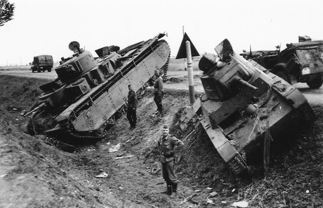 Abandoned T-35 and T-26 Soviet tanks 26 June 1941 worldwartwo.filminspector.com