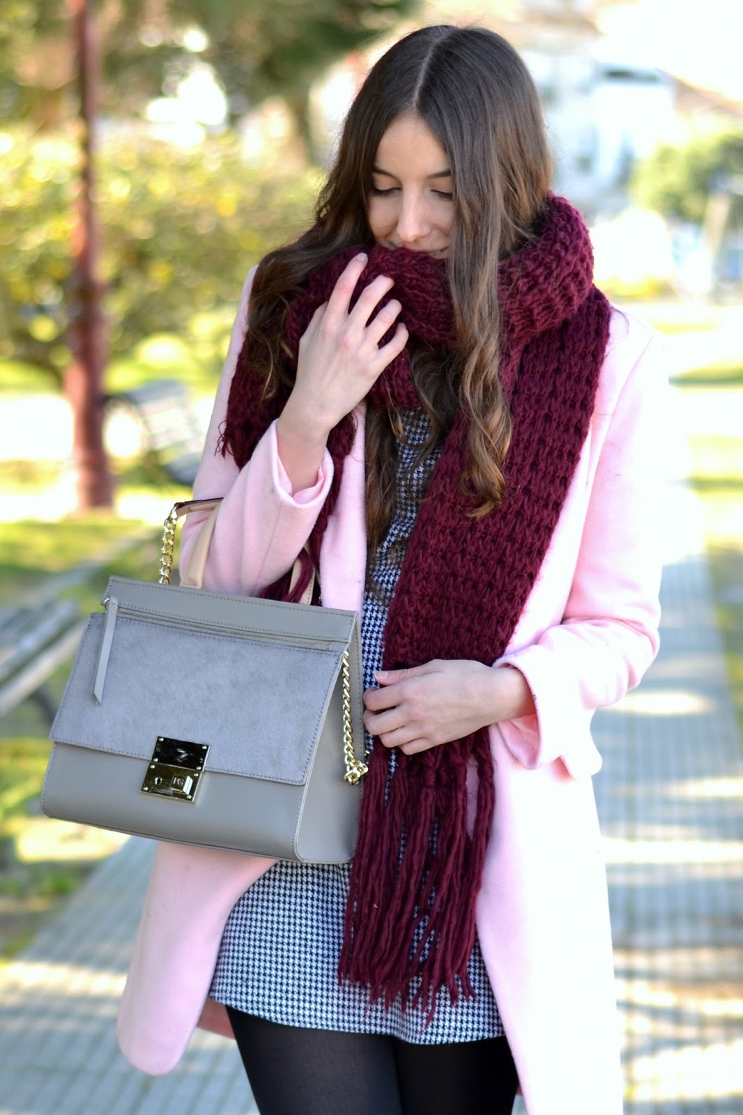 pink coat, burgundy scarf