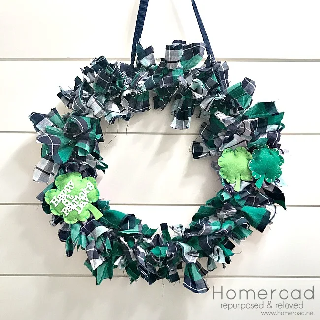 rag wreath on shiplap wall