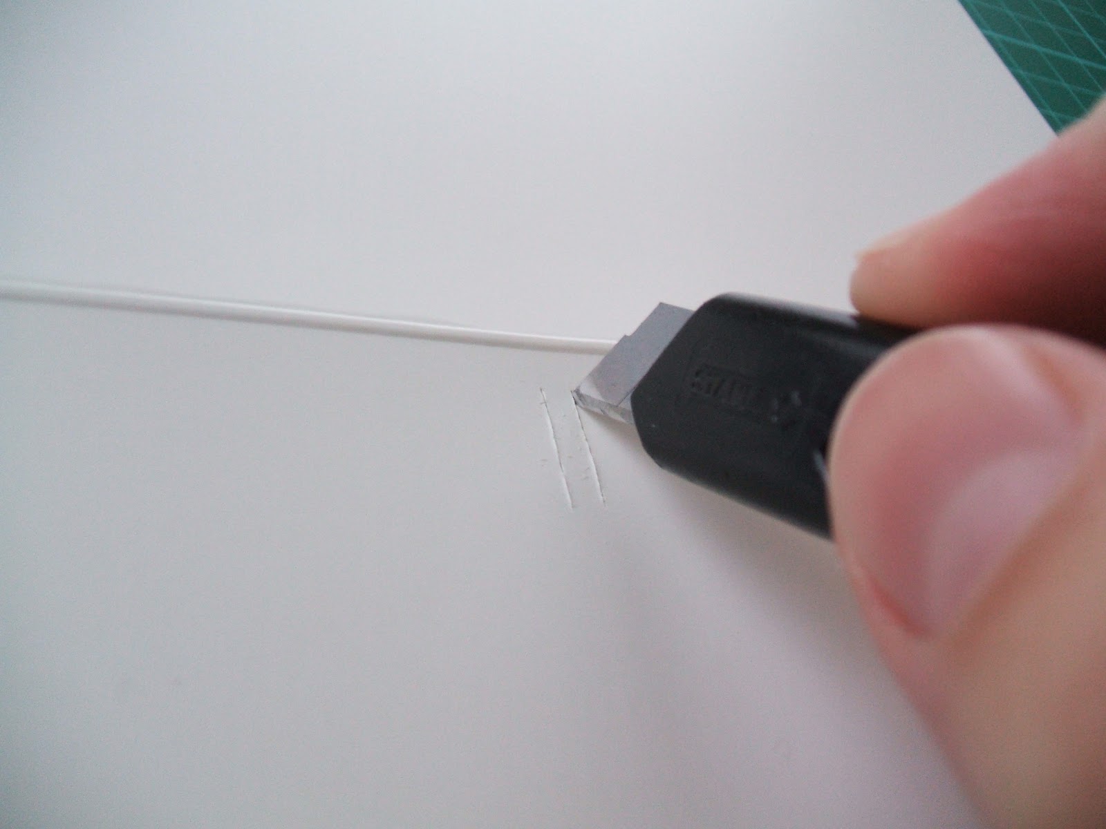 say it says: How to tie a ribbon round a card