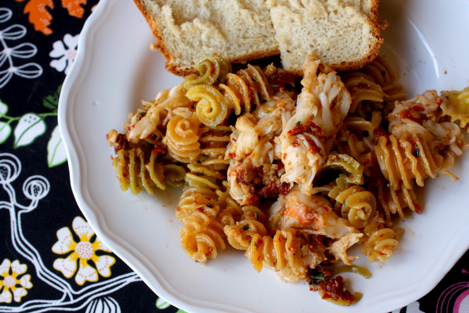 Emerald Rice Cooking lobster and sundried tomatoes over pasta