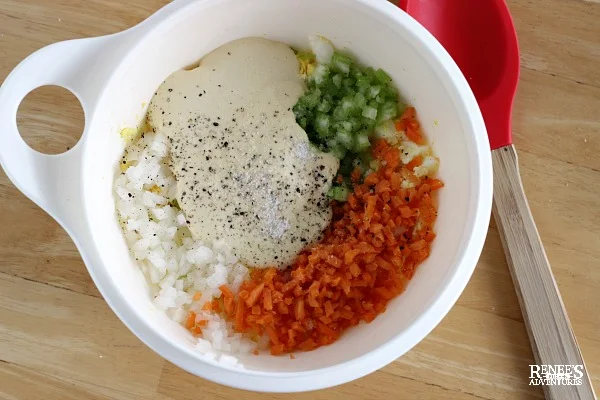 Ingredients for egg salad in a white bowl