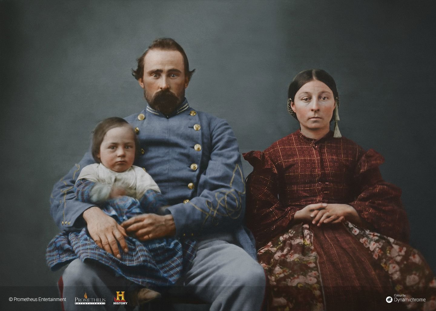 Confederate soldier takes time out for a family portrait.