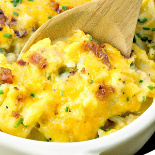 This Loaded Cauliflower Casserole recipe is Keto friendly, and gluten-free, with tender cauliflower, bacon, and cheese. It's a family favorite alternative to loaded baked potatoes #keto #lchf #lowcarb #glutenfree #cauliflower #cheese #casserole #recipe | bobbiskozykitchen.com