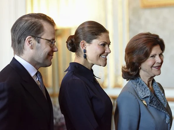 Poland's President Andrzej Duda and his wife Agata Kornhauser-Duda. Crown Princess wore Yves Saint Laurent Suede Pumps, Greta midi dress in blue, Dolce Gabbana handbags, Ebba Brahe earrings