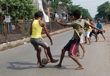 Indian kids playing football