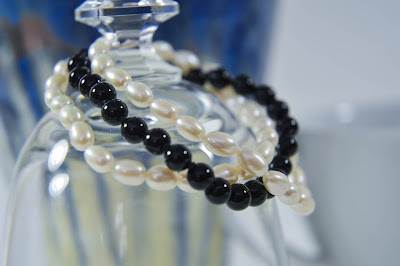 triple strand cuff bracelet white rice pearls and black onyx