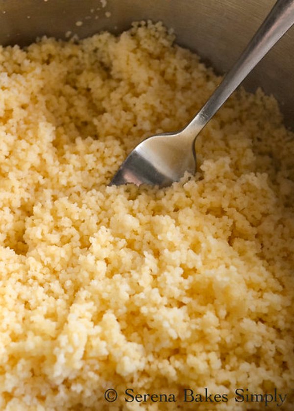 Fluff Couscous with a fork. Light fluffy Couscous recipe.