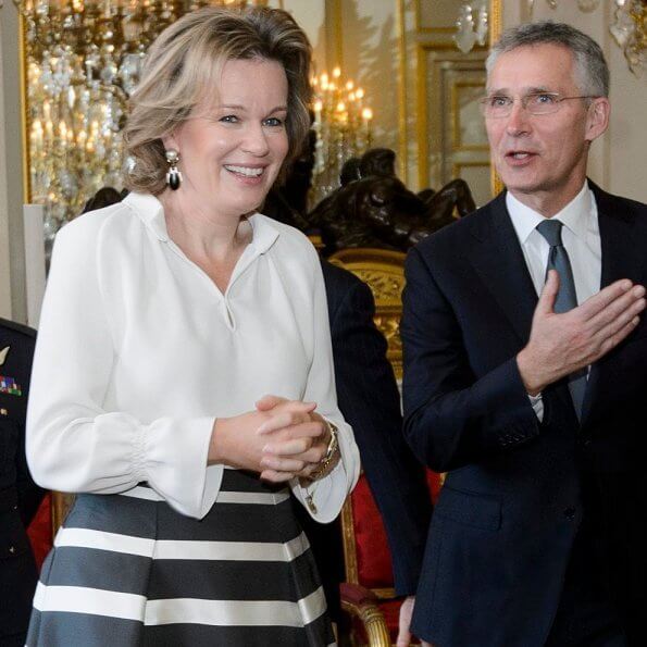 Queen Mathilde of Belgium held a new year's reception at the royal palace in Brussels. Queen Mathilde wore a skirt by Natan
