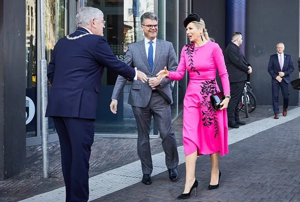 Queen Maxima wore Oscar De La Renta pink midi dress