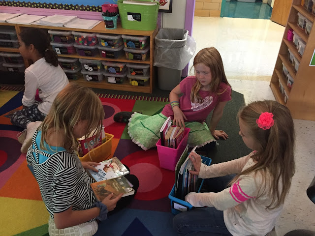 three kids talking about reading