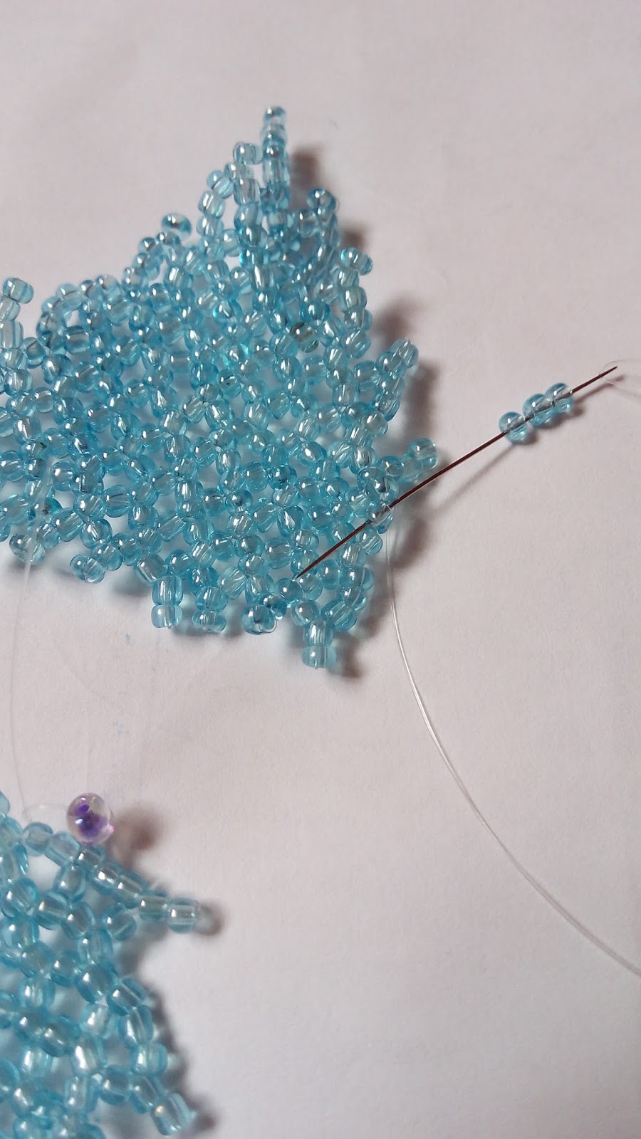 Beadination Beautiful beaded flower using the bead netting technique.