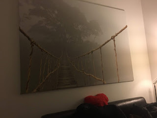 picture of a rope bridge in the mist
