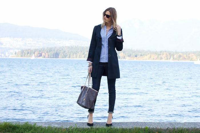 Vancouver Fashion Blogger, Alison Hutchinson, is wearing an RW & Co navy trench coat, Zara blue striped button up top, Rag & Bone skinny jeans, Zara black suede pumps, and a Michael Kors tote.